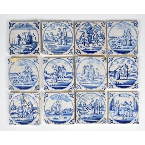 A set of twelve Dutch Delft blue and white tiles, probably 1...