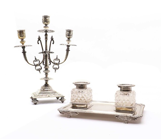 A silver ink stand with two cut glass ink wells