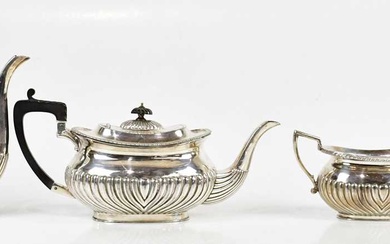A silver plated four piece tea service with gadrooned decoration...