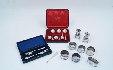 A small group of silver, comprising: a cased set of six Victorian Onslow pattern teaspoons, London, 1895, Goldsmiths & Silversmiths Co (William Gibson & John Lawrence Langman); two napkin rings, Birmingham, 1919 and 1920, William Hutton & Sons Ltd;...