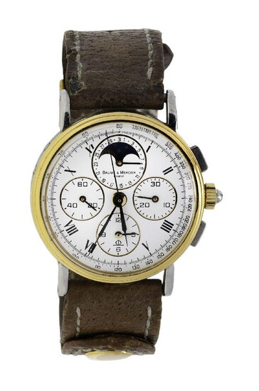 A stainless steel and gilt triple calendar chronograph two tone wristwatch, by Baume & Mercier, the circular dial applied with Roman numerals with four subsidiary dials including moon-phase, two tone steel case and leather strap, mechanical...