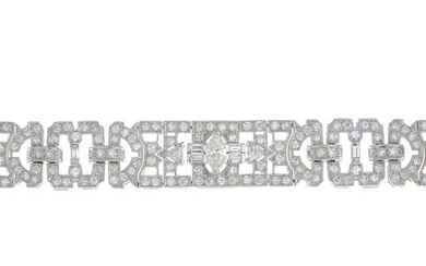A vari-hue diamond bracelet.Estimated total diamond