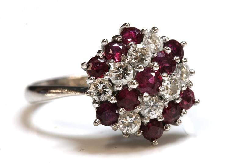 A white gold ruby and diamond hexagonal cluster ring