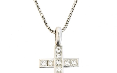 An 18ct gold diamond cross pendant