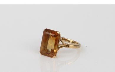 An 18ct yellow gold and yellow stone ring - unmarked, tests ...