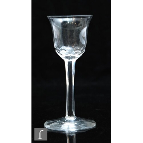 An 18th Century drinking glass circa 1780, the bell form bow...