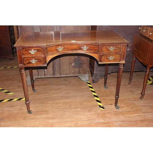 An Edwardian inlaid mahogany dressing table fitted five draw...