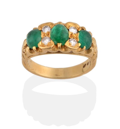 An Emerald and Diamond Ring, three graduated cabochon emeralds spaced...