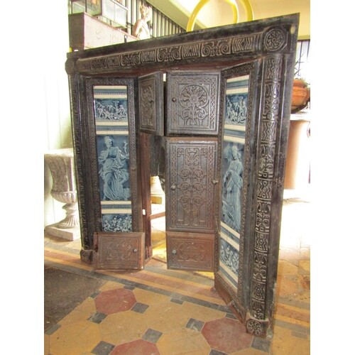 An aesthetic period cast iron fire surround with blue and wh...