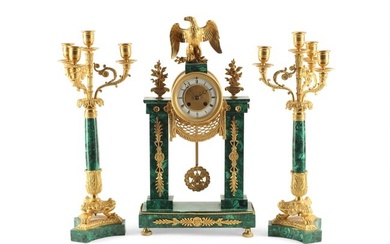 An assembled French clock garniture