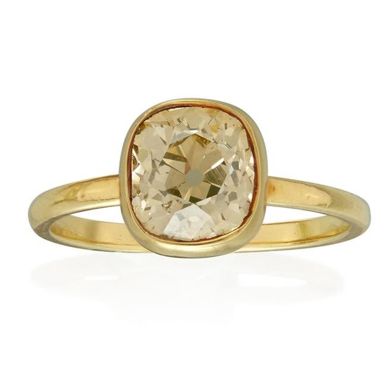 An eighteen karat gold and yellow diamond ring