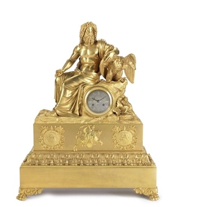 An impressive early 19th century French gilt bronze figural mantel clock