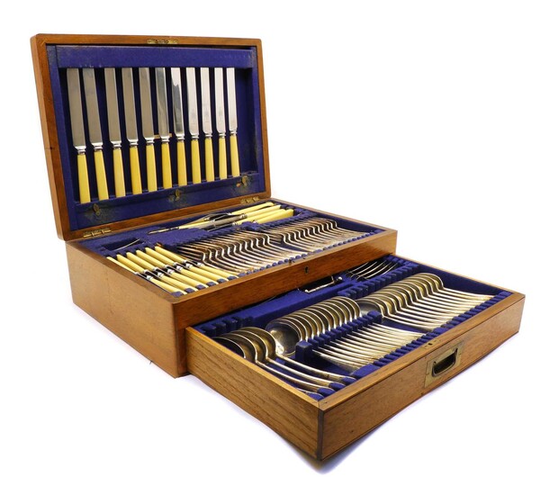 An oak cased canteen of silver plated cutlery