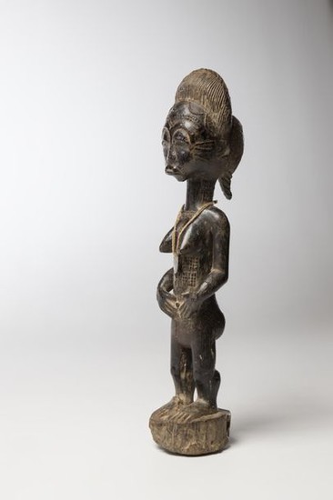 BAOULE, Ivory Coast. Female statue "Blolo Bla" with...