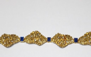 Bracelet articulé en or jaune 750°/°° à cinq...