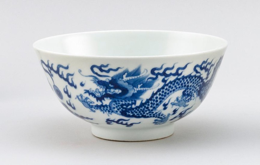 CHINESE BLUE AND WHITE PORCELAIN BOWL Five-clawed dragon decoration. Six-character Kangxi mark on base. Diameter 6.3".