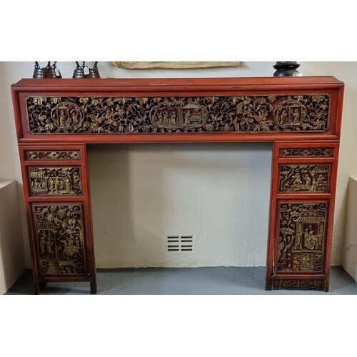 Chinese red painted fire surround with pierced panels depict...