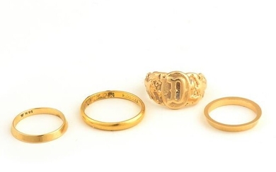 Collection of Four Yellow Gold Rings.