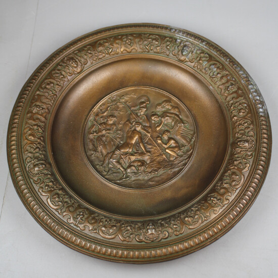 DISH, metal with relief decoration.