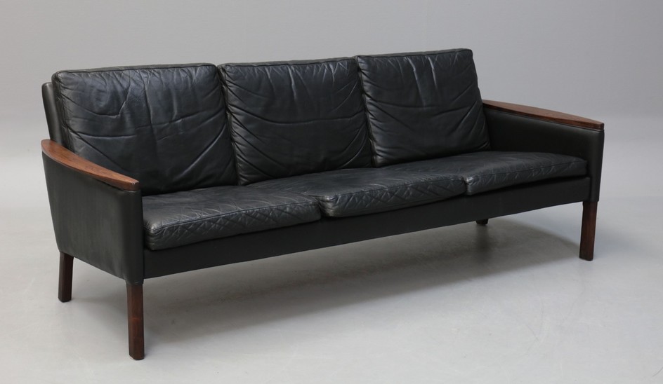 Danish furniture designer. Three-seater free-standing sofa, rosewood and leather, the 1960s