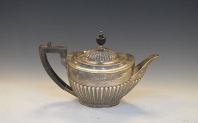 Edward VII silver teapot of gadrooned oval form, London...