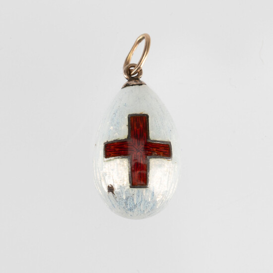 FABERGÉ MINIATURE EGG PENDANT, gold, silver and enamel, height 16 mm, St Petersburg ca 1915.
