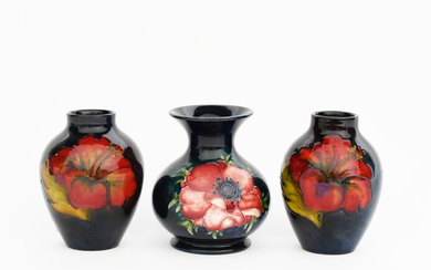 'Flambe Hibiscus' a pair of Moorcroft Pottery vases designed by Walter Moorcroft