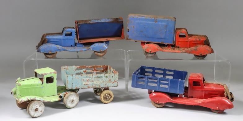 Four Tin Plate Truck Models, Circa 1940's, including covered...