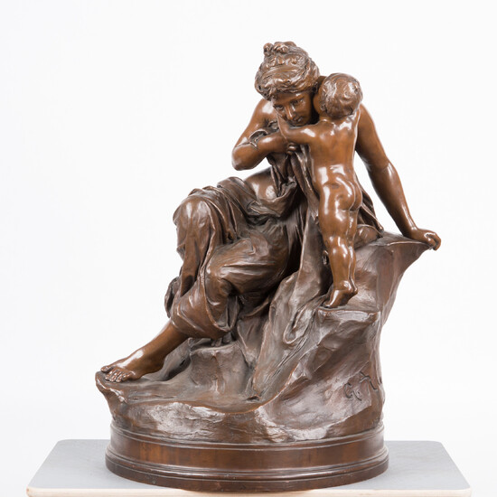 G. RUTZ. Sculpture / figurine, seated woman with putto, metal.