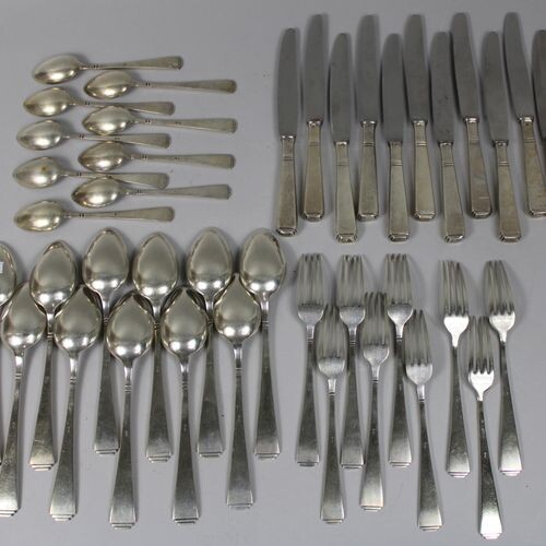 Housewife's part in silver, plain Art Deco style, consisting of...