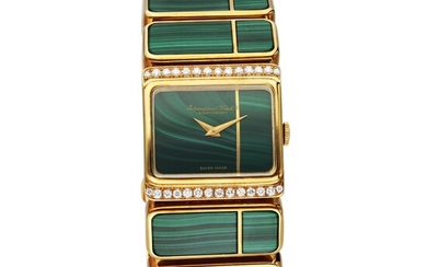 IWC Reference 7152 'Khanjar' | A yellow gold, malachite and diamond-set bracelet watch with a matching pair of ear clips, pendant with chain, and ring, Circa 1970