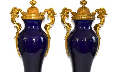 Impressive Pair of 19th cent. French ormolu mounted cobalt blue porcelain vases and covers