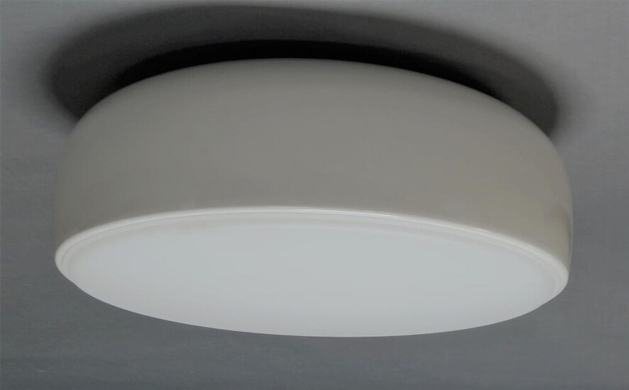 Jasper Morrison for Flos, a 'Smithfield' ceiling light, of recent manufacture, with domed white powder coated aluminium shades enclosing three lights, with injection moulded opalescent methacrylate diffuser, 22cm high, 60cm diameter It is the...
