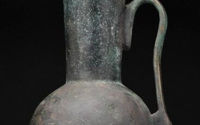 LATE SASSANIAN OR EARLY ISLAMIC BRONZE EWER WITH