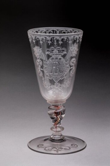 LEG GLASS with the KING of POLAND in blown glass, flared shape with engraved decoration. Rich ornamentation with monogrammed "AR" decoration on a cartouche surmounted by a cup with pearled garlands and a crucigerous orb for the royal crown, surrounded...