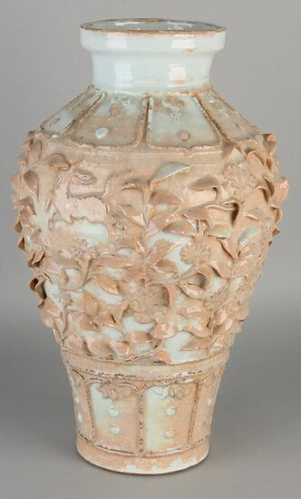 Large Chinese porcelain vase with decorated flowers.