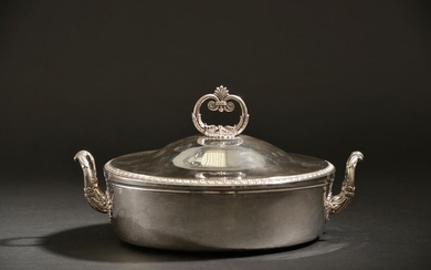 Silver covered vegetable dish edged with a frieze of palmettes,...