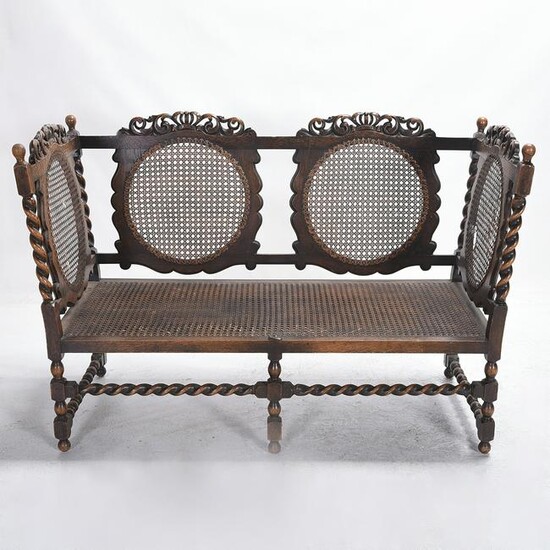 Louis XVI Style Carved Oak and Cane Settee.