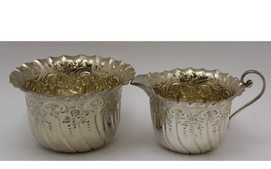 MAPPIN BROTHERS A Victorian embossed silver cream jug & bowl...