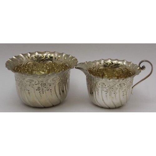 MAPPIN BROTHERS A Victorian embossed silver cream jug & bowl...