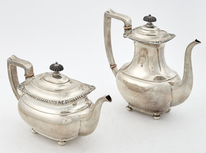 Meriden Brittania Co. Sterling Silver and Ebonized Wood Five-Piece Footed Coffee and Tea Service