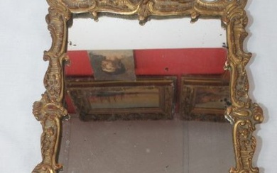 Miroir en bois doré. Style Rocaille. 34 x... - Lot 843 - Enchères Maisons-Laffitte