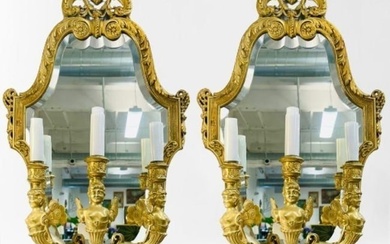 Pair of neoclassical style bronze girandole wall sconces, the fine bronze frame with mirror back and