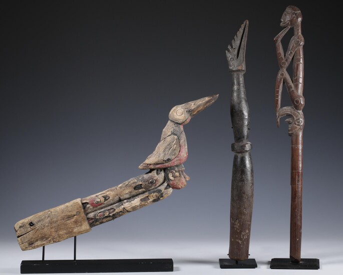 Papua, Wakda-Yamna, prow ornament, an Asmat top of an implement with human figure and a...