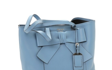 NOT SOLD. Prada: A bag made of blue leather with silver toned hardware and one...