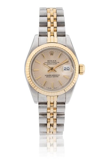 Rolex. A lady's 18ct gold and steel automatic calendar bracelet watch, Datejust, Reference, 69173, Serial Number 9271019, c.1986 champagne dial with applied gold baton hour markers and luminous dots, magnified date aperture at 3, sweep centre...