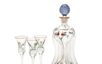 Russian glass bottle with three matching glasses, decorated with painted flowers in colours. Marked sc. 20th century. H. 15 og 28 cm. (4).