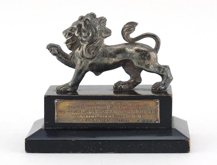Silver model of a lion, presented to J K Chande, Kuala
