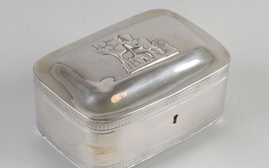 Silver tea box, rectangular model with rounded corners and 2 edged edges, placed on 4 ball legs. On top of the hinged lid is a soldered image of a figure with a harp outside on a bench, partly worn. The box has a lock. Approved with a label for...