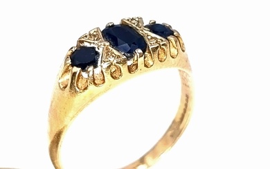 Star Lot : A nice example of a three stone sapphire ring set...